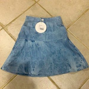 Denim look girls skirt size 6. 70%cotton 30%polyester pockets, button, elastic